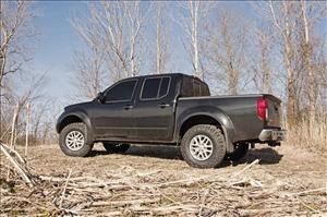 2.5 Inch Leveling Kit Red Spacers Front Nissan Frontier (05-26)/Xterra (05-15) Rough Country
